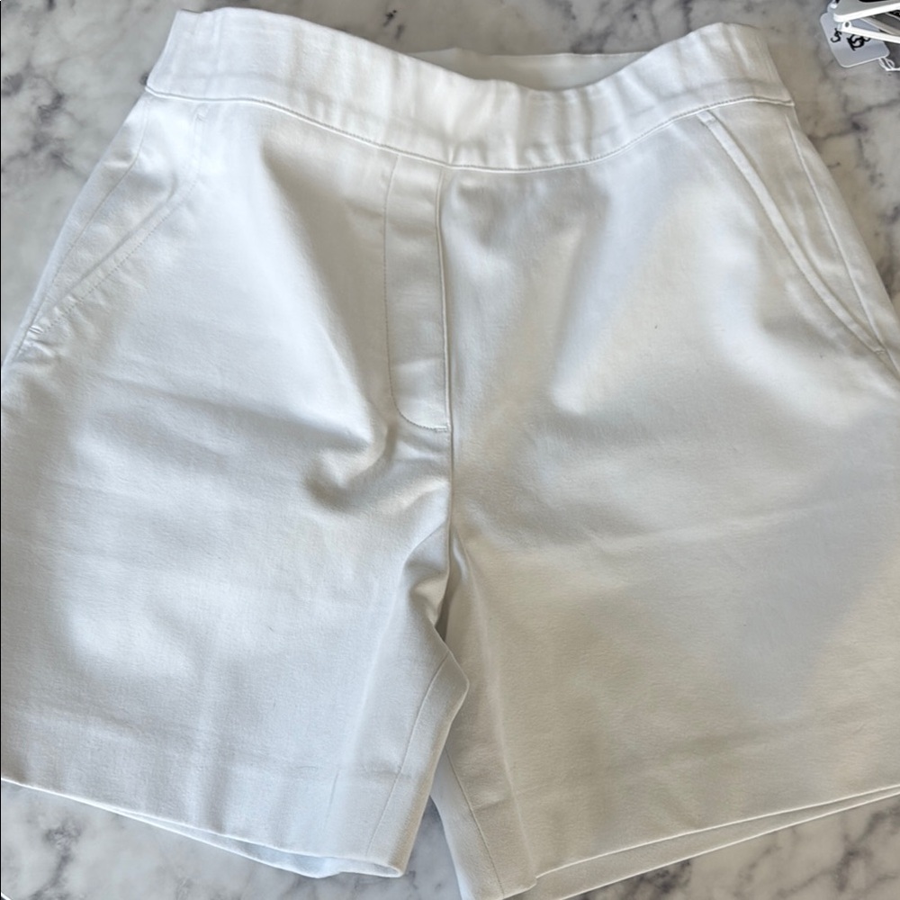 Spanx Women's White Shorts never worn. Lining to prevent see through.